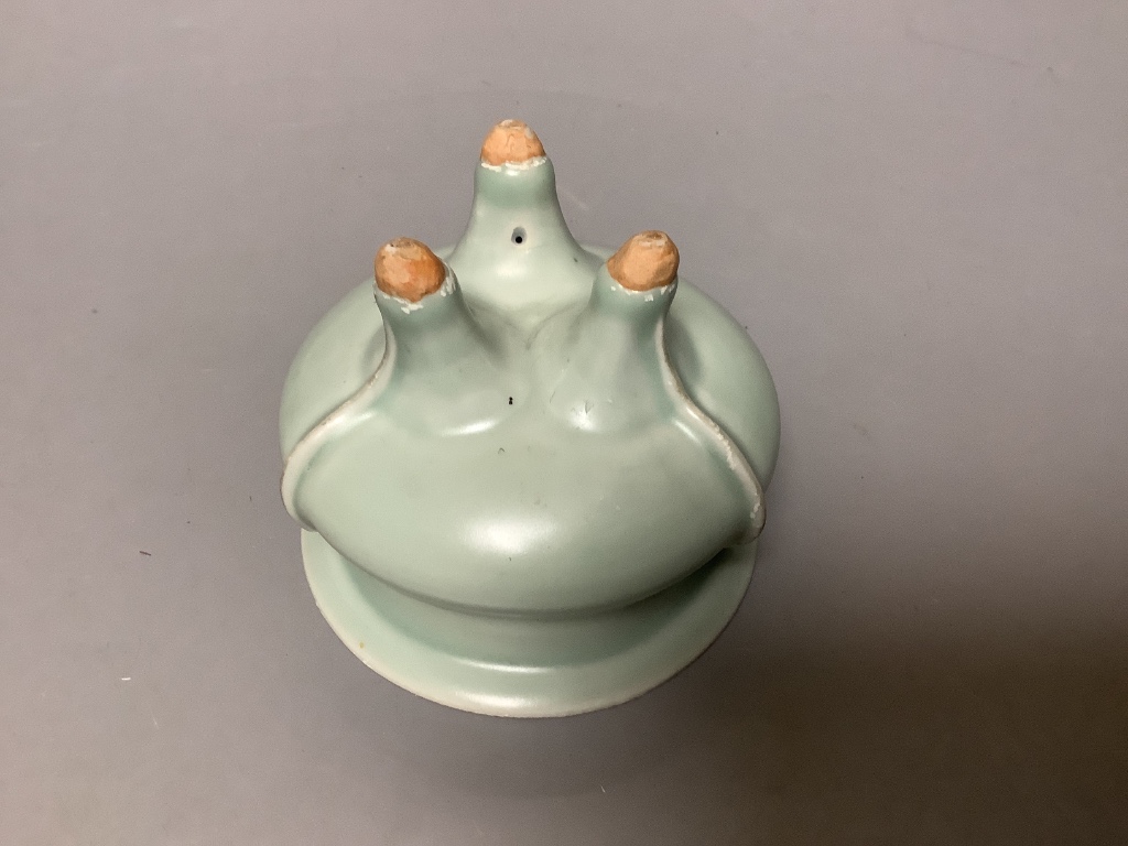 A Chinese celadon glazed tripod censer, diameter 11cm